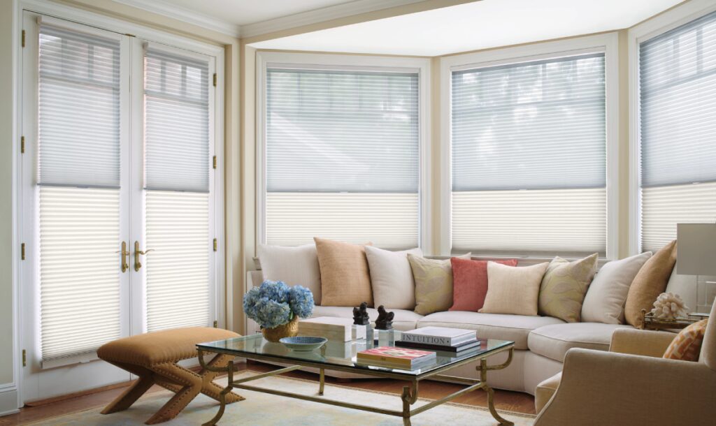 Hunter Douglas Duette® Cellular Shades as energy-efficient window treatments in a cozy living room